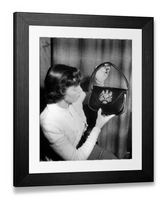 Framed Print : Coronation Souvenir Mrs A Taylor holding a black handbag with coat of arms and Royal Framed Print : Coronation Souvenir Mrs A Taylor holding a black handbag with coat of arms and Royal