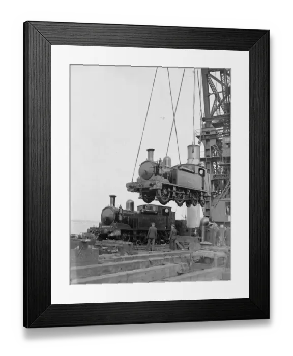 Framed Print : Loading two railways engines by the 150 ton floating crane for the Isle of Wight holiday rush