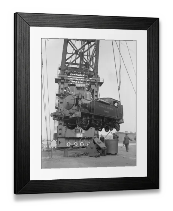 Framed Print : Loading two railways engines by the 150 ton floating crane for the Isle of Wight holiday rush