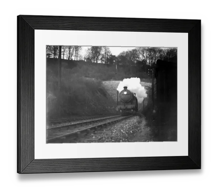 Framed Print : Train emerging from a tunnel. 1934