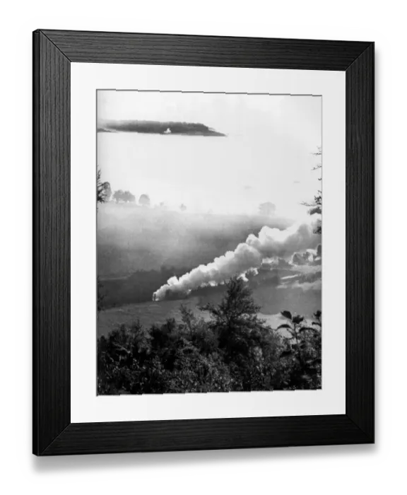 Framed Print : A steam train rattles through a misty valley Framed Print : A steam train rattles through a misty valley