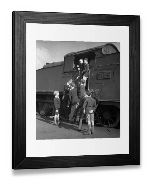 Framed Print : Trainspotters Club outing Young members of the trainspotters club gather around Framed Print : Trainspotters Club outing Young members of the trainspotters club gather around