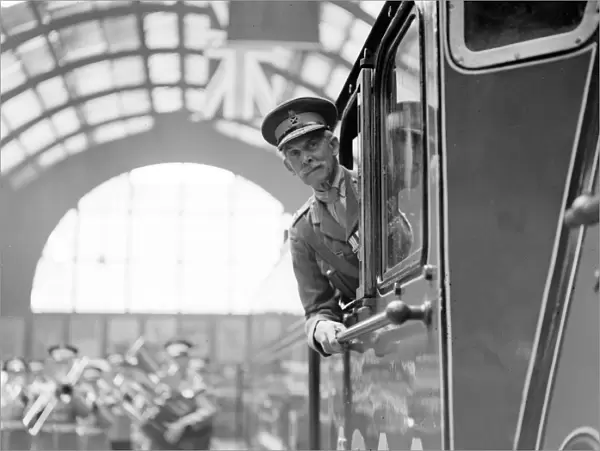 At Kings Cross, Major General Sir Cecil Pereira in the cab of Coldstreamer, the