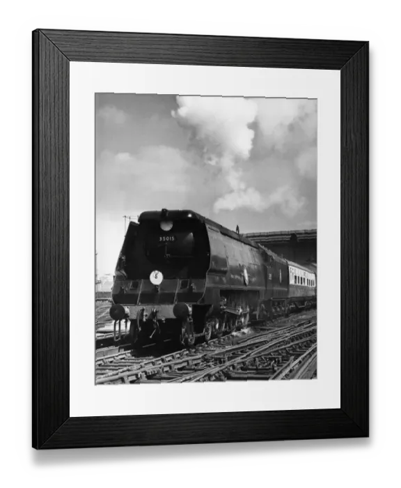 Framed Print : The Southern Region Atlantic Coast Express steams out of Waterloo Station on its Framed Print : The Southern Region Atlantic Coast Express steams out of Waterloo Station on its