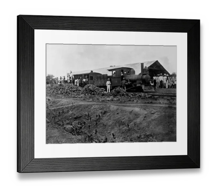 Framed Print : Railway station with steam train. Bricks can be seen that built the platform Framed Print : Railway station with steam train. Bricks can be seen that built the platform