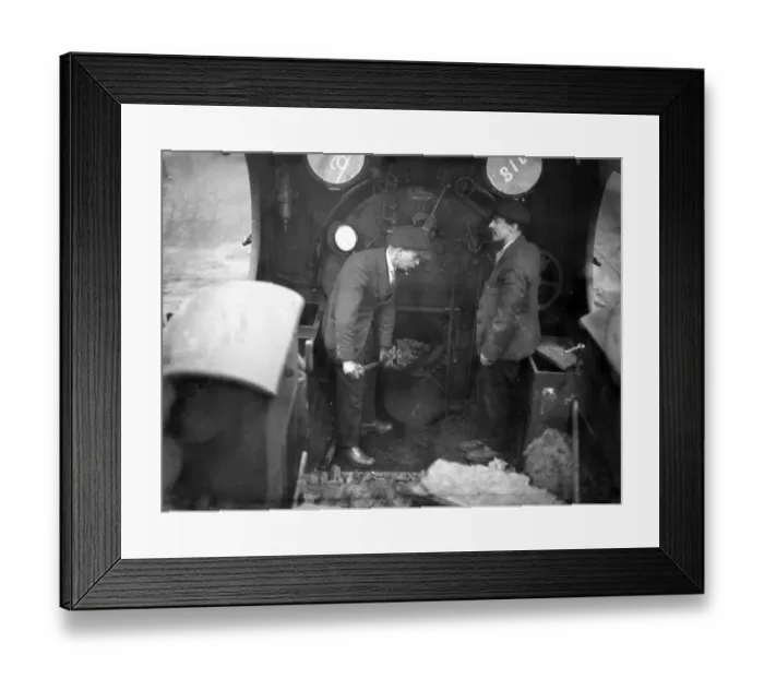 Framed Print : Railway scenes. Fireman stoking 28 January 1924