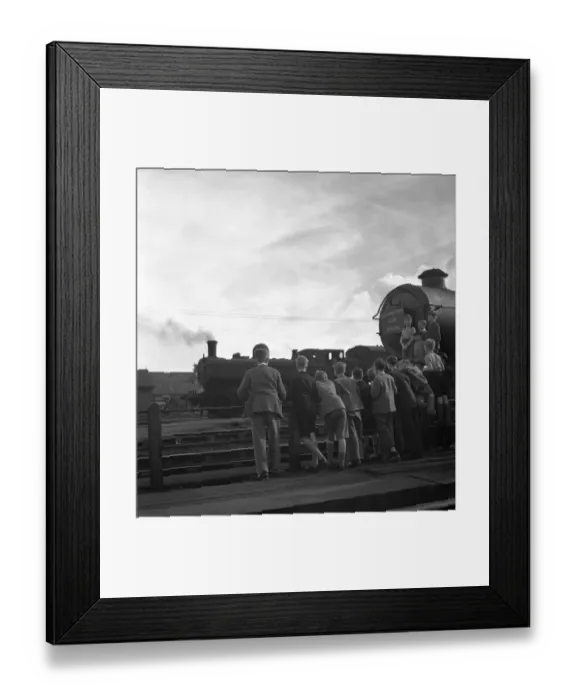 Framed Print : Trainspotters Club outing Young members of the trainspotters club admire the steam