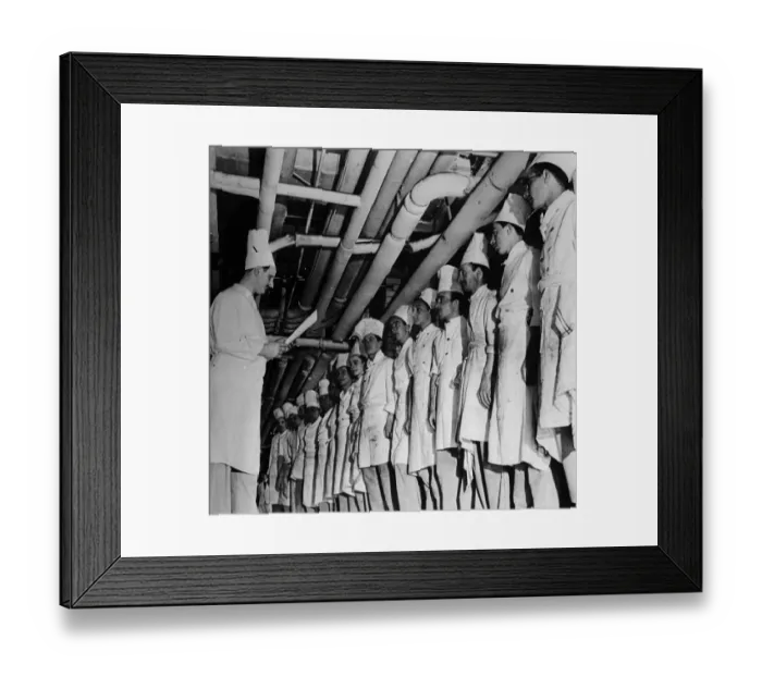 Framed Print : Lamouille, assistant chef of the Ritz Hotel for ten years reads out the orders of Framed Print : Lamouille, assistant chef of the Ritz Hotel for ten years reads out the orders of