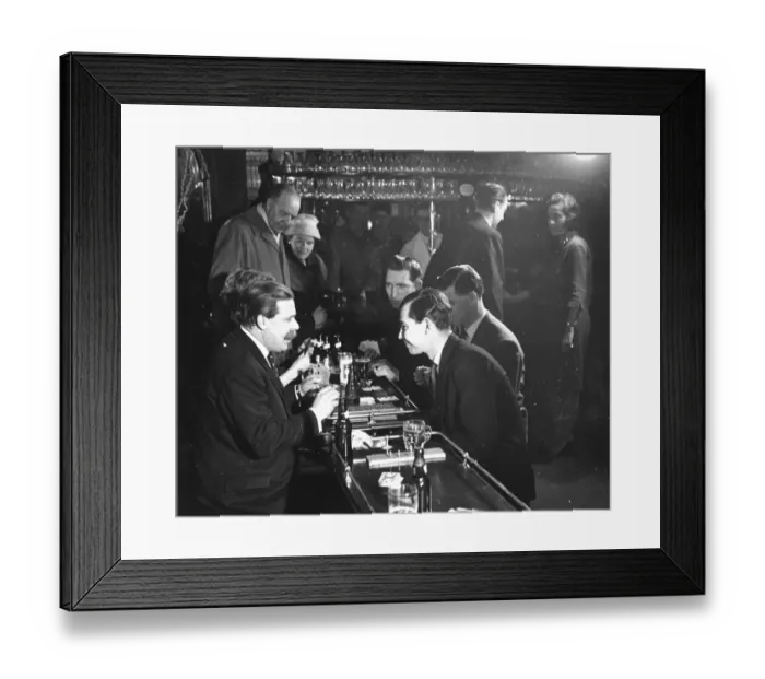 Framed Print : Male customers take advantage of the new gaming and betting act which makes it legal to play cards