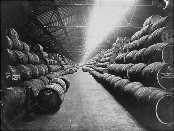 10000 barrels of rum in store at West India Docks, London, England undated