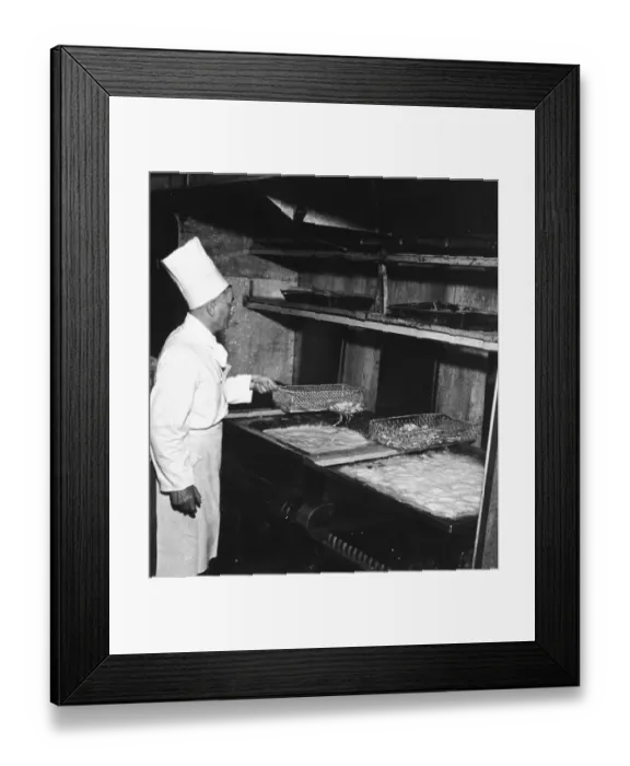 Framed Print : The chipped potatoes, or chips, is one of Britains great favourites and are sent Framed Print : The chipped potatoes, or chips, is one of Britains great favourites and are sent