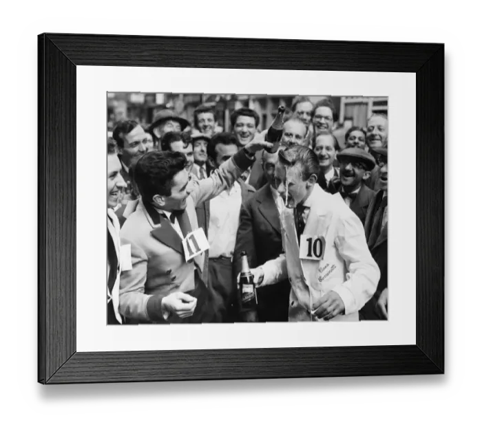 Framed Print : Michael Bushell, the youngest competitor at age 15, is splashed with champagne by Framed Print : Michael Bushell, the youngest competitor at age 15, is splashed with champagne by