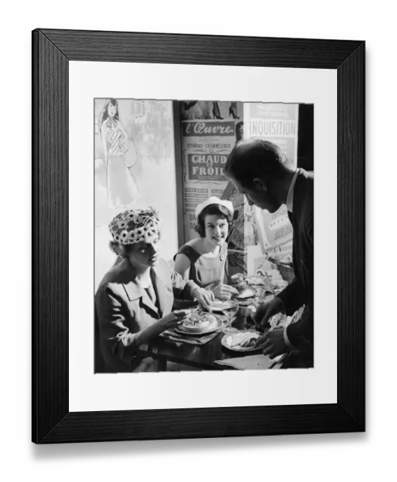 Framed Print : A waiter serves two ladies at lunch in Le P tit Monmartre, Marylebone Lane, London Framed Print : A waiter serves two ladies at lunch in Le P tit Monmartre, Marylebone Lane, London