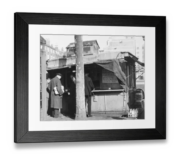 Framed Print : John Barclay, the owner of this tea stall, is giving it away for free to anyone who Framed Print : John Barclay, the owner of this tea stall, is giving it away for free to anyone who