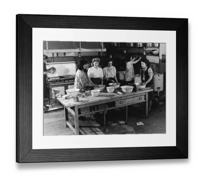 Framed Print : Teaching young women cooking in a kitchen 1950s Framed Print : Teaching young women cooking in a kitchen 1950s