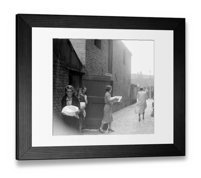 Framed Print : Cooking dinners at the communal ovens in the East End of London. 1933 Framed Print : Cooking dinners at the communal ovens in the East End of London. 1933