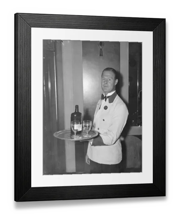 Framed Print : Waiter who strikes a different note, successful composer of music in his spare time Framed Print : Waiter who strikes a different note, successful composer of music in his spare time