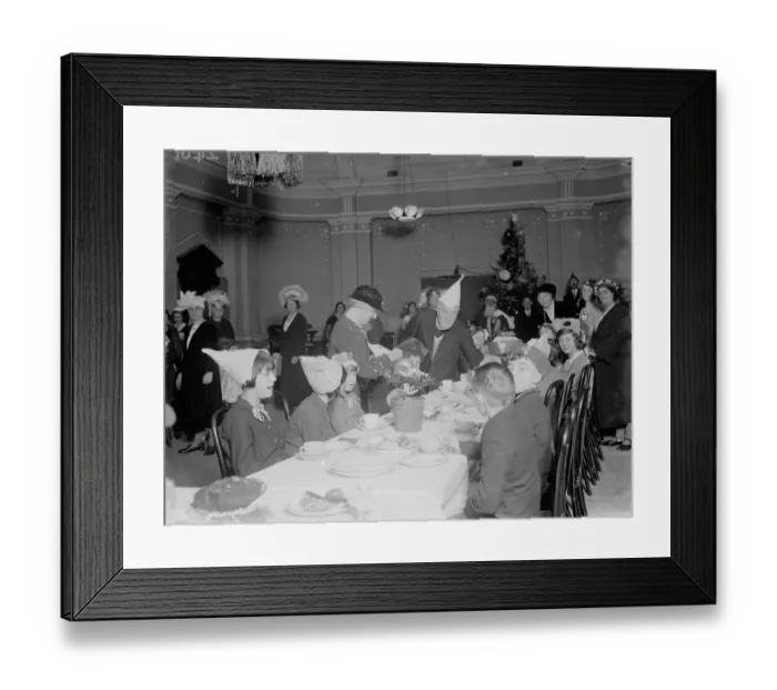 Framed Print : The Old Contemptibles childrens party. Serving the children their party food Framed Print : The Old Contemptibles childrens party. Serving the children their party food