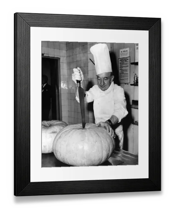 Framed Print : Jean Boutheney, a French chef born in Newcastle-upon-Tyne, chops a large pumpkin Framed Print : Jean Boutheney, a French chef born in Newcastle-upon-Tyne, chops a large pumpkin