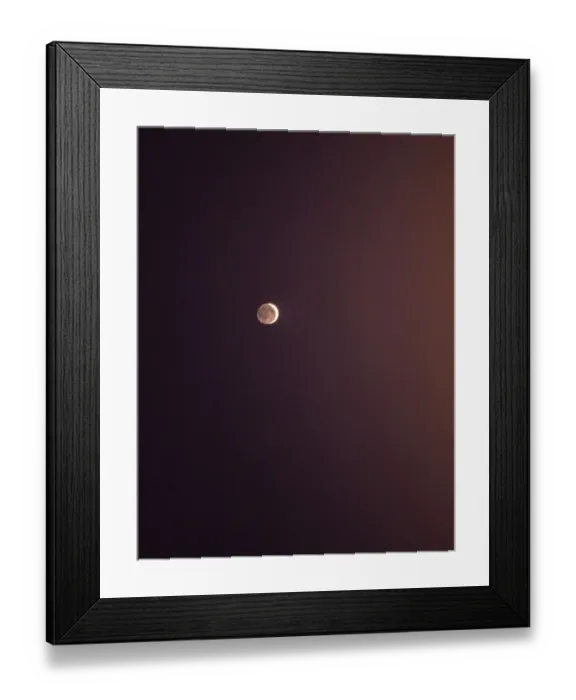 Framed Print : Moon in the night sky. Crescent moon with the reflection of sunlight thrown by Framed Print : Moon in the night sky. Crescent moon with the reflection of sunlight thrown by