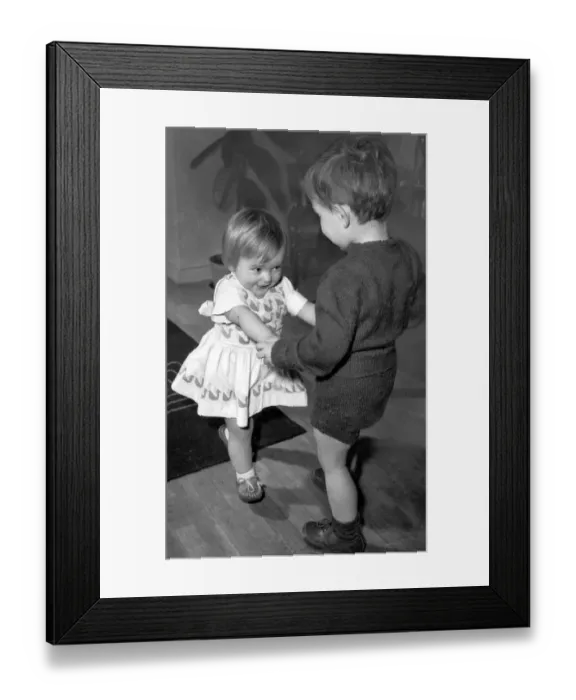 Framed Print : Boy and girl toddlers playing together dancing partners dance / dancing / party season Framed Print : Boy and girl toddlers playing together dancing partners dance / dancing / party season