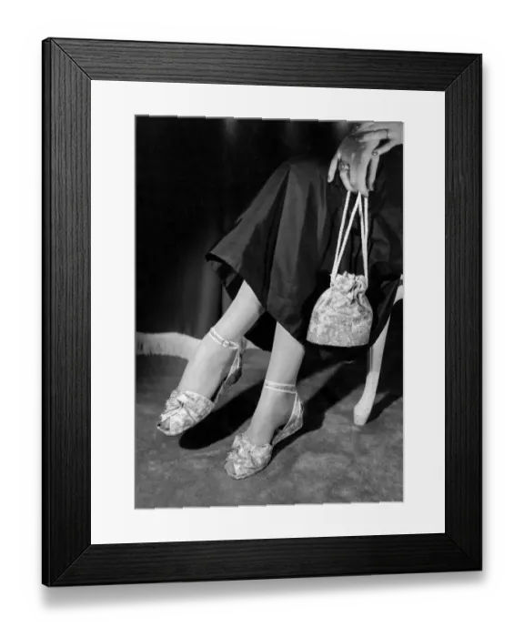 Framed Print : Dance sandals for Christmas parties are made in exquisite pastel brocades, and black or white Framed Print : Dance sandals for Christmas parties are made in exquisite pastel brocades, and black or white