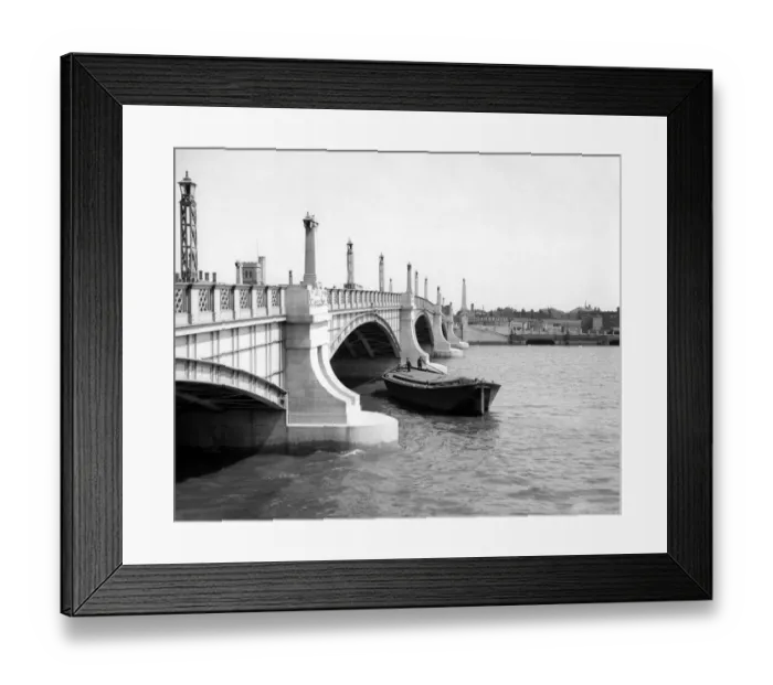 Framed Print : Watermen steering their barge underneath Lambeth Bridge, London