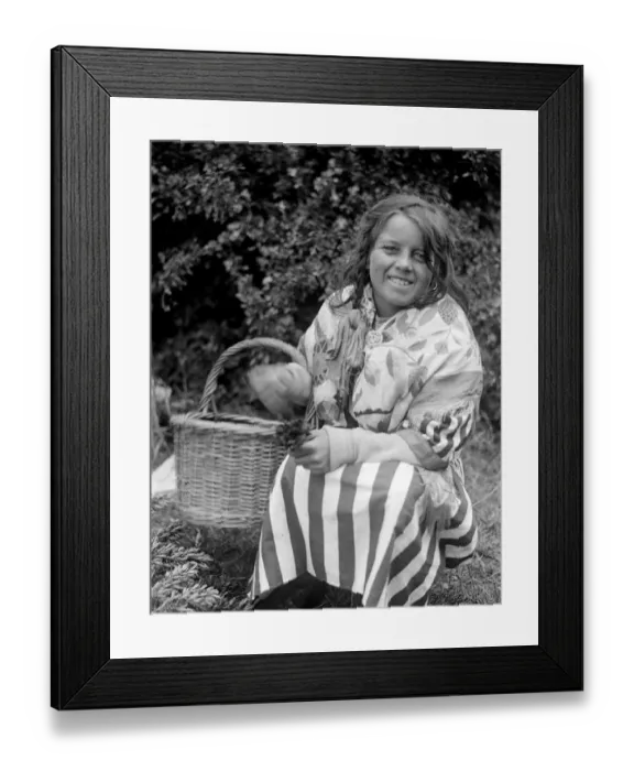 Framed Print : Gypsy girl with her basket of lucky heather. Late 1940s, early 1950s Framed Print : Gypsy girl with her basket of lucky heather. Late 1940s, early 1950s