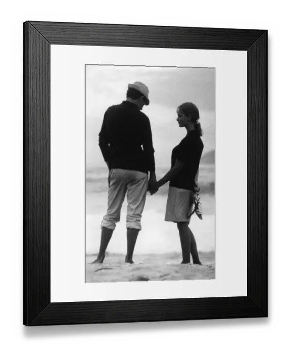 Framed Print : Young couple holding hands on the beach. love couple romance romantic for valentines