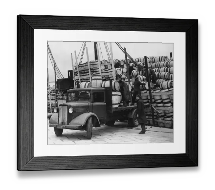 Framed Print : Barrels for the Shetland catch of herring being unloaded at Lerwick, 1949 Framed Print : Barrels for the Shetland catch of herring being unloaded at Lerwick, 1949