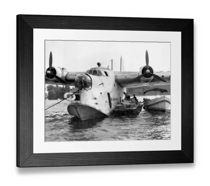 Framed Print : German workmen unload food from a British Royal Air Force flying boat, one of ten Framed Print : German workmen unload food from a British Royal Air Force flying boat, one of ten
