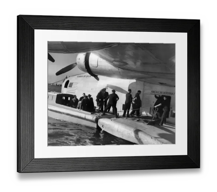 Framed Print : Passengers boarding a flying boat the Bermuda Sky Queen leaving Poole for America Framed Print : Passengers boarding a flying boat the Bermuda Sky Queen leaving Poole for America