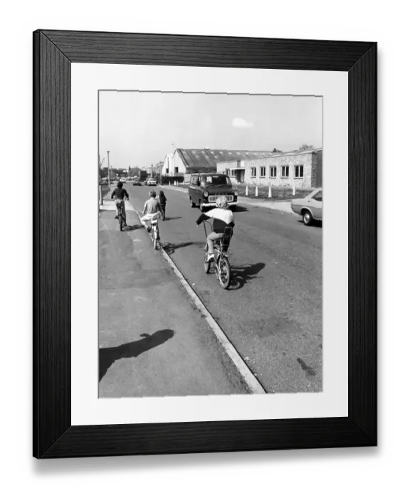 Framed Print : Young boys riding their bicycles around the Trading Estate, Fircroft Way, Edenbridge, Kent, England, UK. Circa 1970's Framed Print : Young boys riding their bicycles around the Trading Estate, Fircroft Way, Edenbridge, Kent, England, UK. Circa 1970's