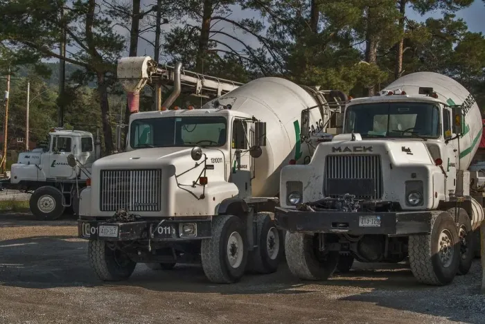 Framed Print : 3 x cement mixers parked up on waste ground on Manitoulin Island Ontario Canada Framed Print : 3 x cement mixers parked up on waste ground on Manitoulin Island Ontario Canada
