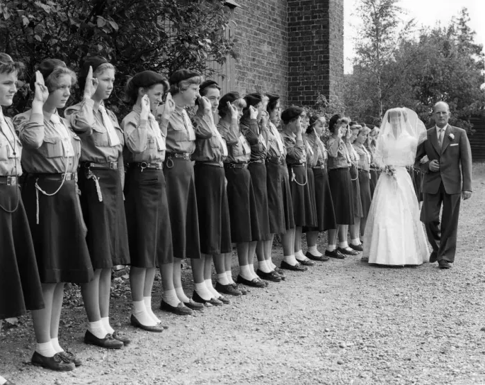Framed Print : The 3rd Swanley Girl Guides form a Guard of Honour at St Marys Church as the bride Framed Print : The 3rd Swanley Girl Guides form a Guard of Honour at St Marys Church as the bride