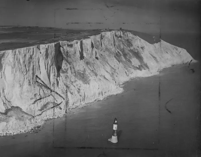 Framed Print : An aerial view of Beachy head, the famous Sussex headband. Portions of the cliff Framed Print : An aerial view of Beachy head, the famous Sussex headband. Portions of the cliff