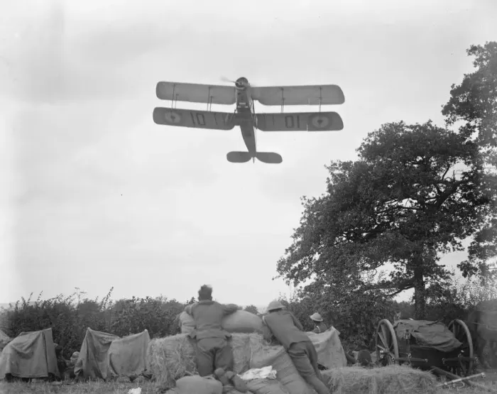 Framed Print : Aeroplanes launch flour bag bombs on troops in great battle of Hogs Back Divisional