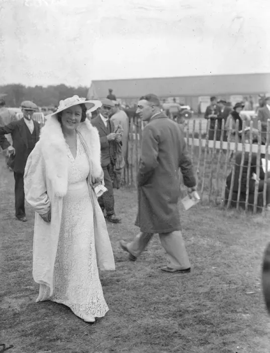 Framed Print : All white at the Derby. A woman Derby spectator in a striking white fashion at Epsom Framed Print : All white at the Derby. A woman Derby spectator in a striking white fashion at Epsom
