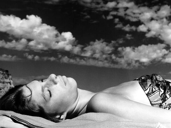 Anne sunbaking at Fairlight Beach, East Sussex, England