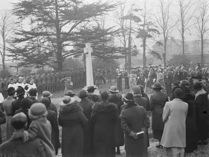 Framed Print : Armistice memorial service in Erith, London, observed through a doorway