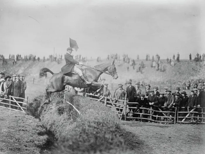 Framed Print : Bar Point to Point Races at Edenbridge Judge Farrant on his horse Thornton Le Moor taking the last fence before winning the bar heavy weight race 1922