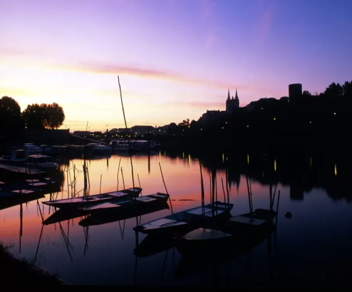 Framed Print : Boats at sunset. Angers, on the banks of the river Maine, Loire Valley. France