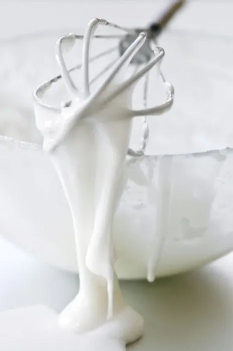 Framed Print : Bowl of white icing with dripping balloon whisk credit: Marie-Louise Avery / thePictureKitchen Framed Print : Bowl of white icing with dripping balloon whisk credit: Marie-Louise Avery / thePictureKitchen