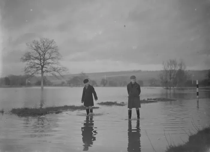 Framed Print : Two boys paddle through the floods in Yalding, Kent. 1936 Framed Print : Two boys paddle through the floods in Yalding, Kent. 1936
