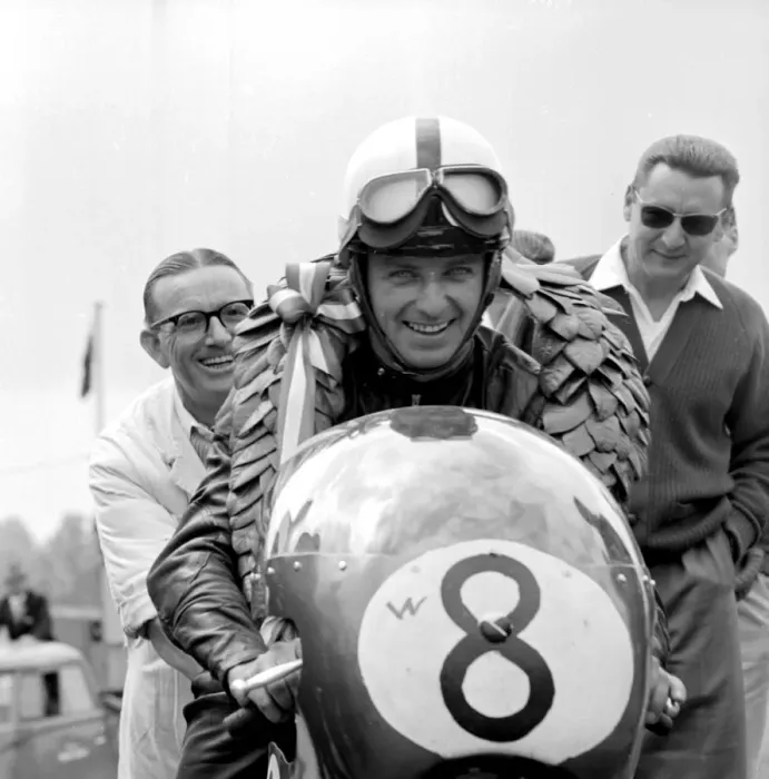 Framed Print : Brands Hatch, Kent: German Motor cycle racing ace, Ernst Degner has a smile of victory Framed Print : Brands Hatch, Kent: German Motor cycle racing ace, Ernst Degner has a smile of victory