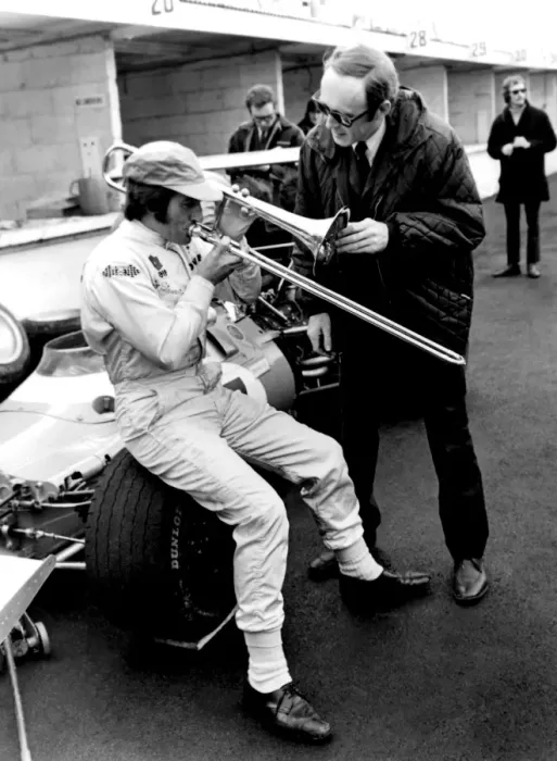 Framed Print : Brands Hatch, Kent: Racing driver Jackie Stewart, of Scotland, isn t really blowing