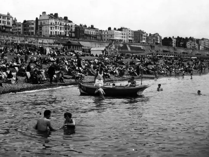Framed Print : Brighton Crowded beaches and boat 1 August 1954