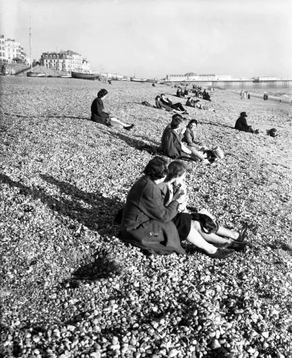 Framed Print : Brighton Enjoying the sunshine on the beach at Brighton, Sussex 5 November 1946