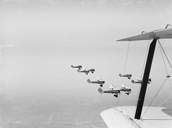 Bristol Bulldogs fighters of No 32 Squadron in formation flying over Biggin Hill