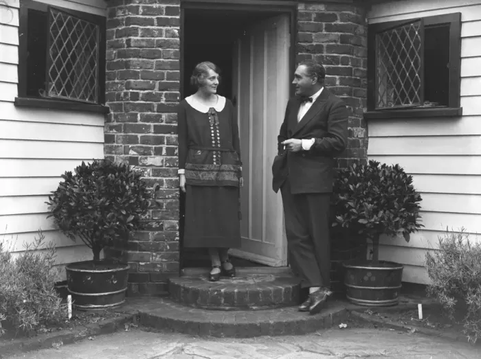 Framed Print : British film stars, Mr Henry Edwards and Miss Chrissie White at their front door Framed Print : British film stars, Mr Henry Edwards and Miss Chrissie White at their front door